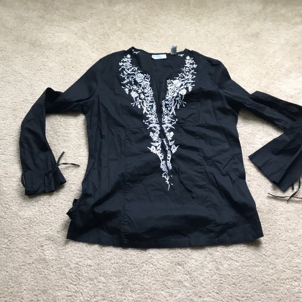 Valerie Stevens shirt 21’ arm pit to armpit 28’ length